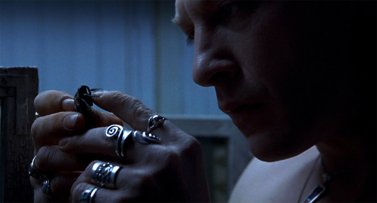 buffalo bill (serial killer) checking a moth in silence of the lambs