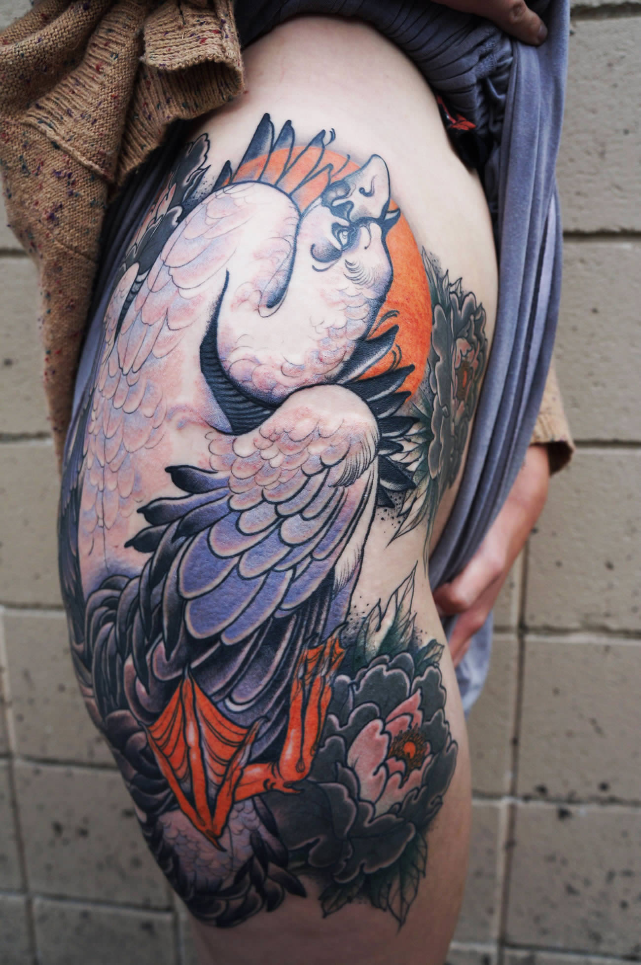 crunched up bird on hip by Matt Lambdin