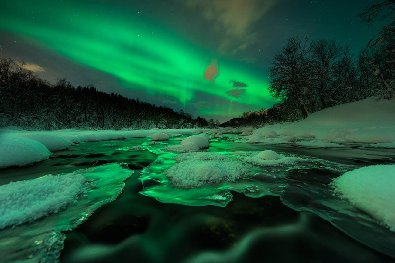 arild heitmann northern lights green landscape