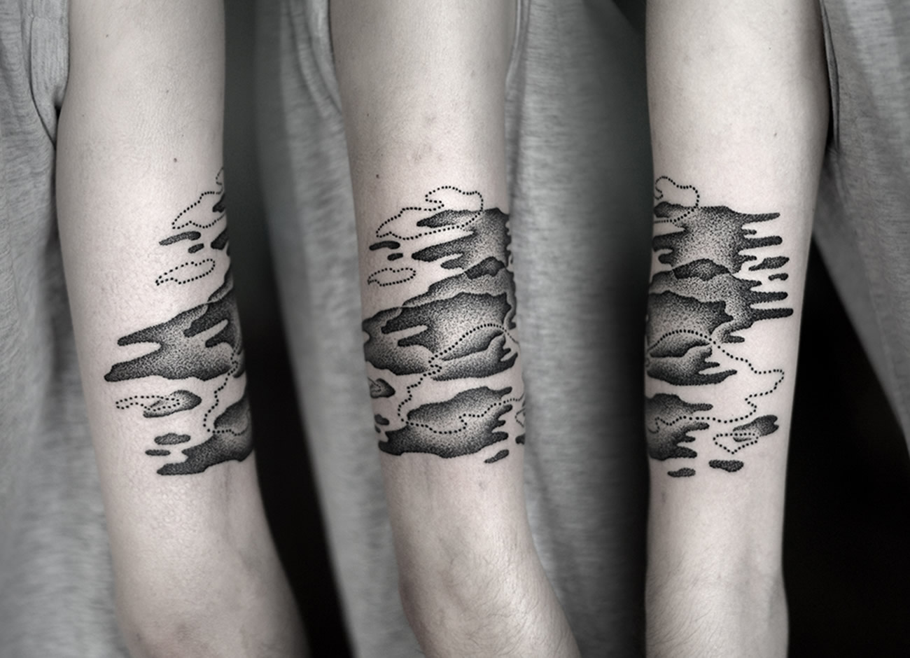 abstract blobs tattooed on arm by Kamil Czapiga