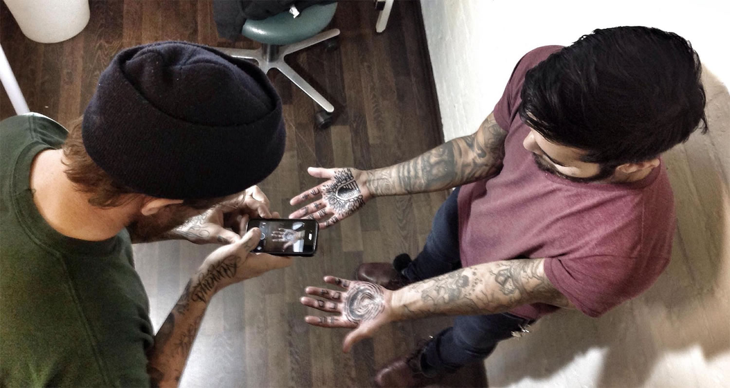 photographing client's tattoos by Brody Polinsky