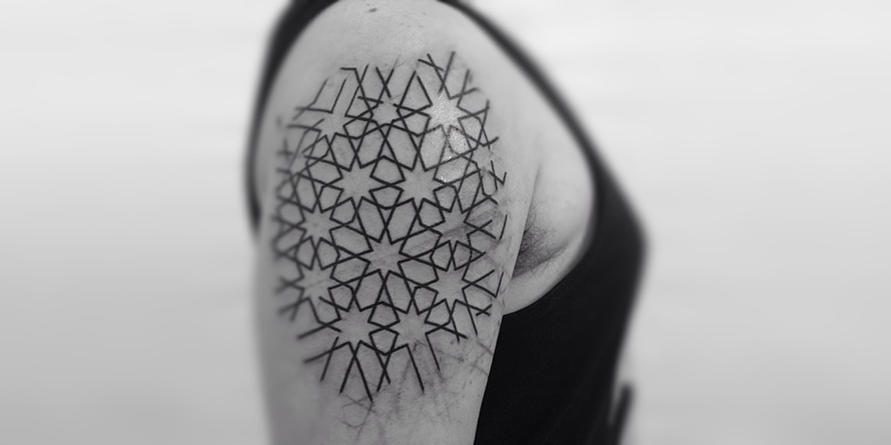 Pattern tattoo on arm by Brody Polinsky