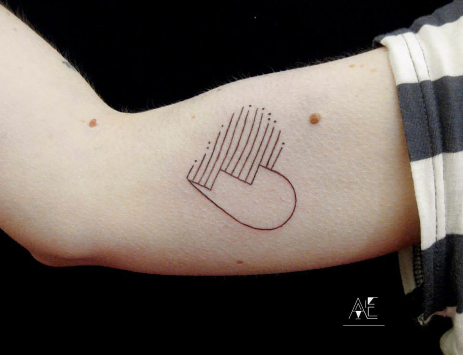 heart tattoo by axel ejsmont