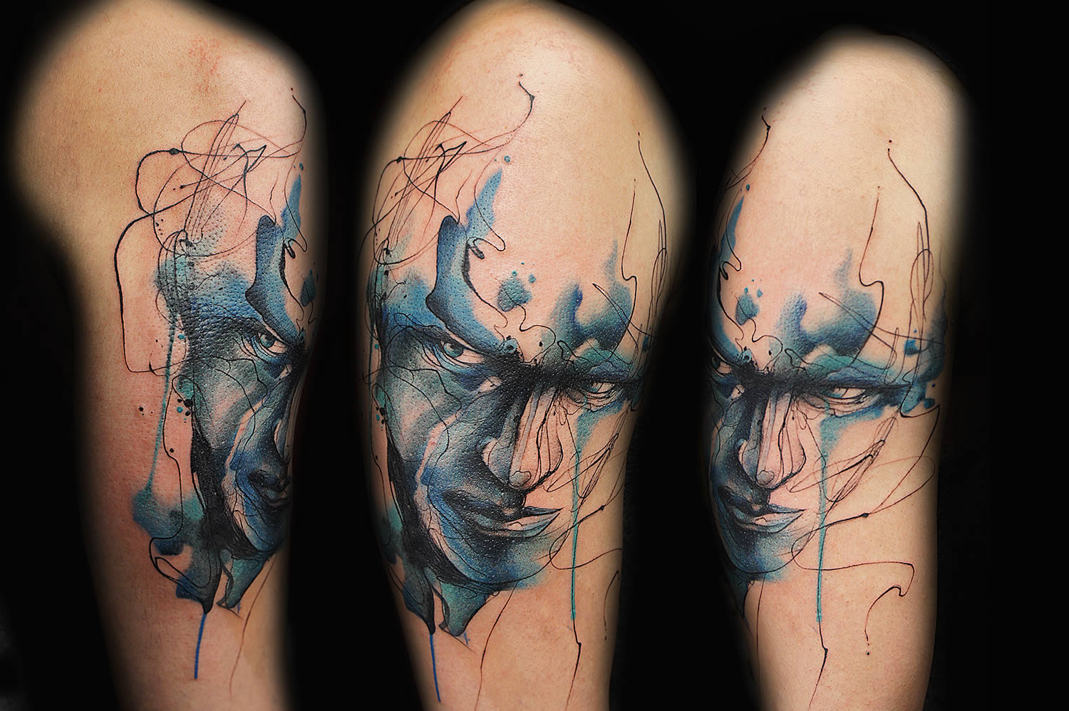 free form blue face on thigh, tattoo by jay freestyle