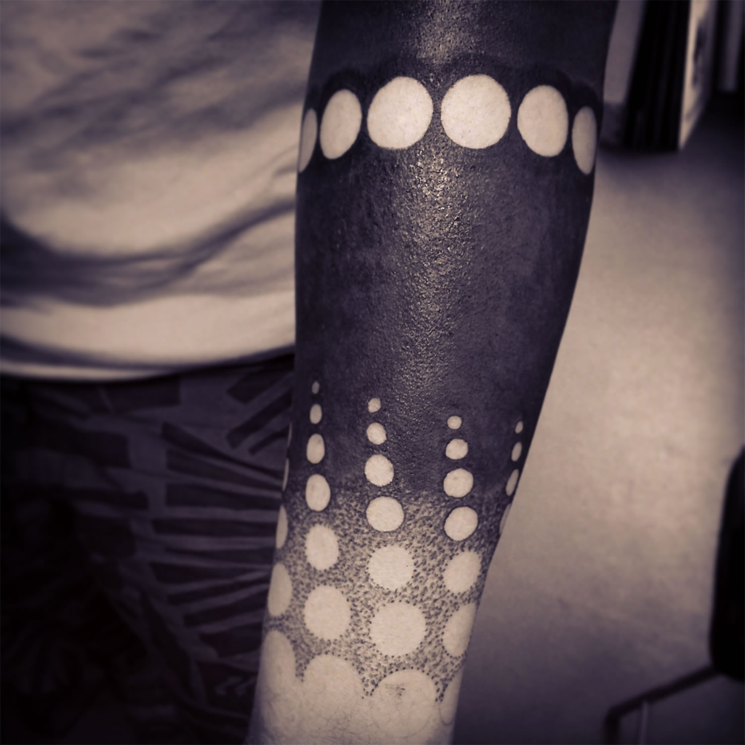 cover up. black with circles, tattoo by jonny breeze