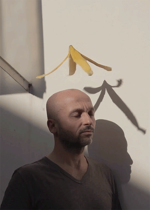 banana twirling over man's head, animated gif by romain laurent