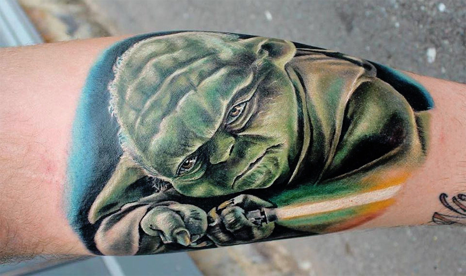 Yoda tattoo with light saber  by Jordan Croke 