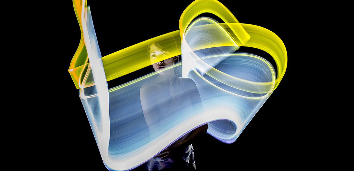 graffiti style light painting in white and yellow, by eric pare