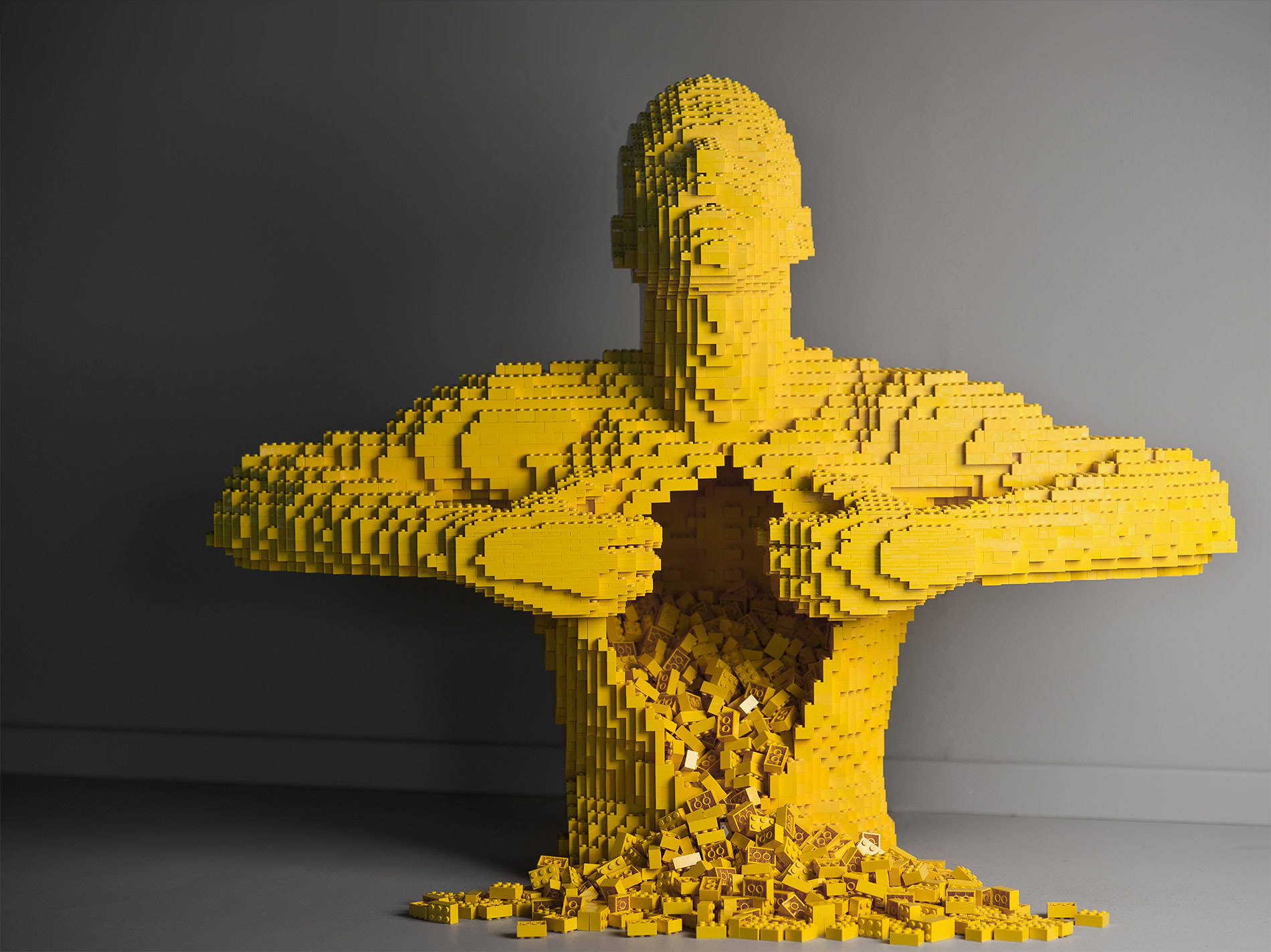 yellow lego man ripping open his chest. Art by nathan sawaya.photo By Erica Ann