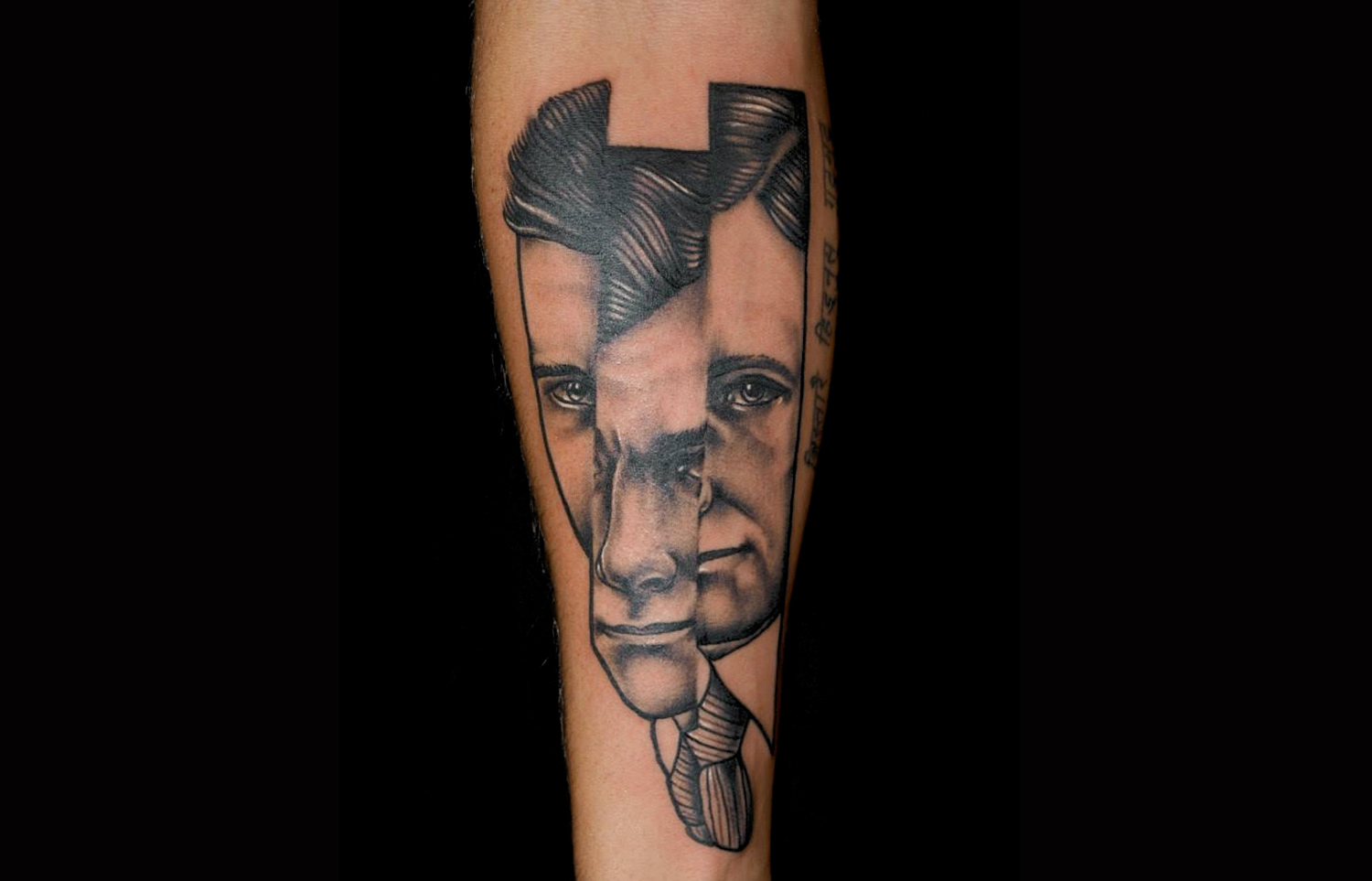 man's face sliced up, tattoo by pietro sedda