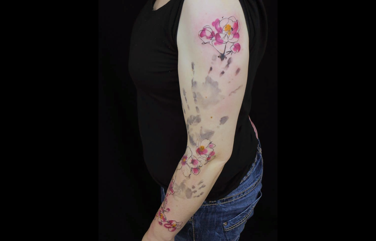 hand print and flowers tattoo by Sara Rosenbaum.
