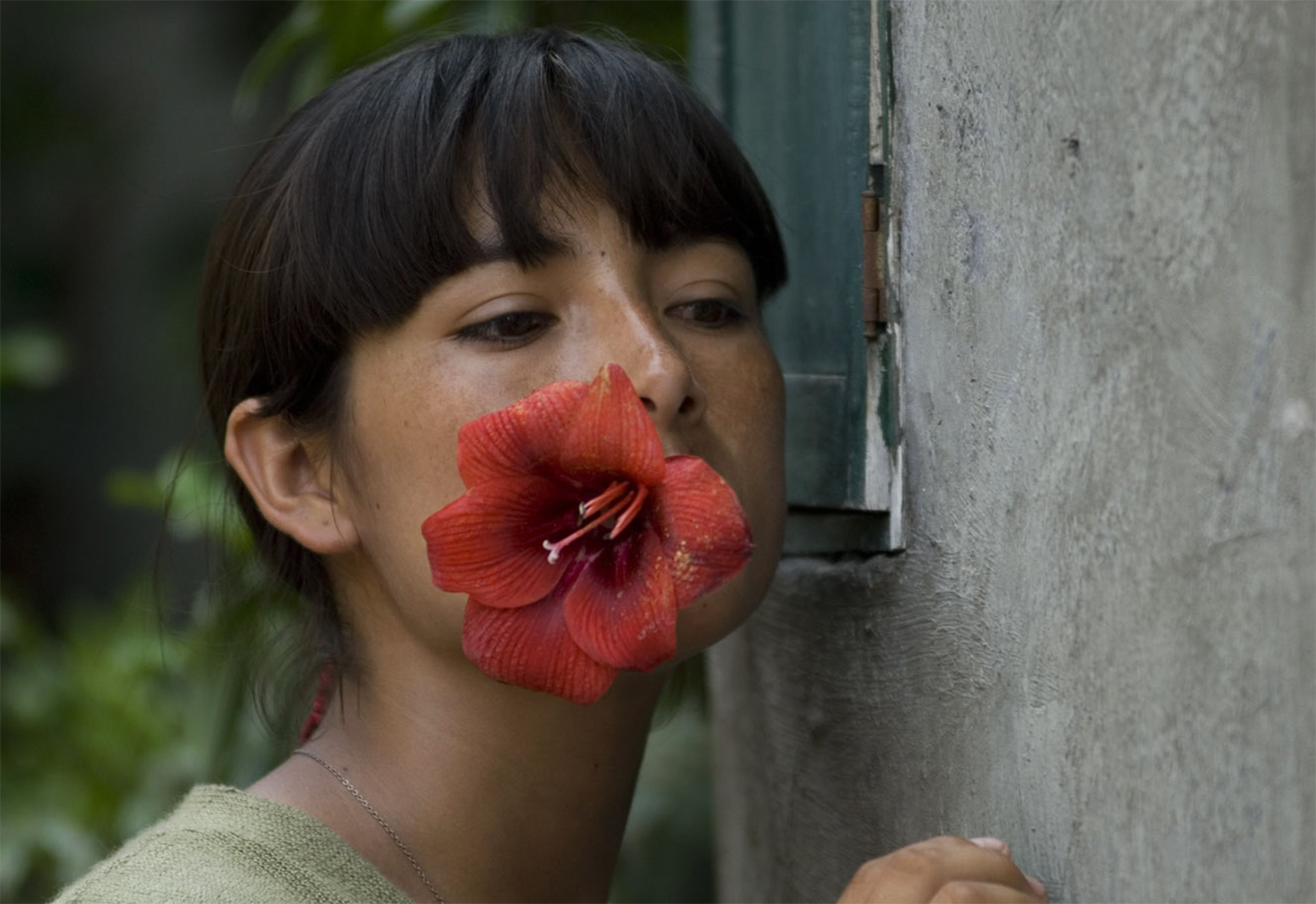 mexican actress with red flower in her mouth, “The Milk of Sorrow”