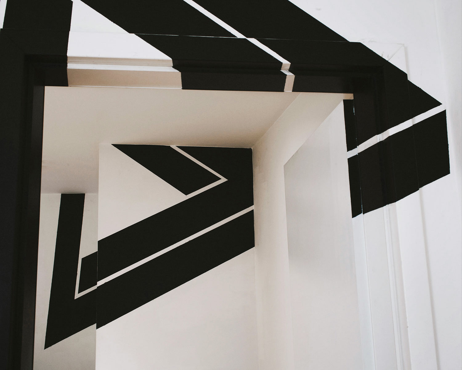 black paint penrose triangle, impossible object, Anamorphic art by fanette g.