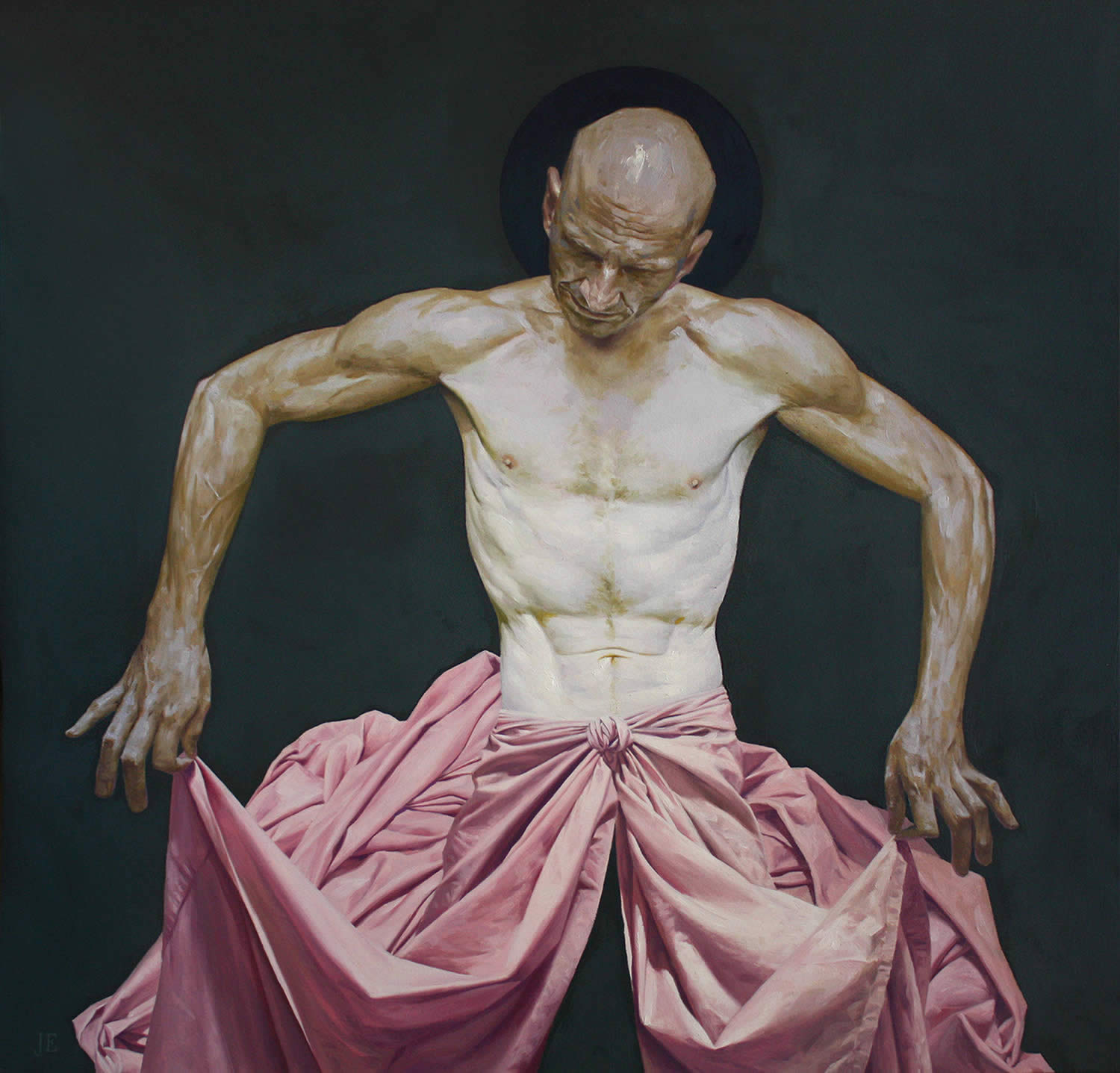 shirtless man with pink cloth around waist