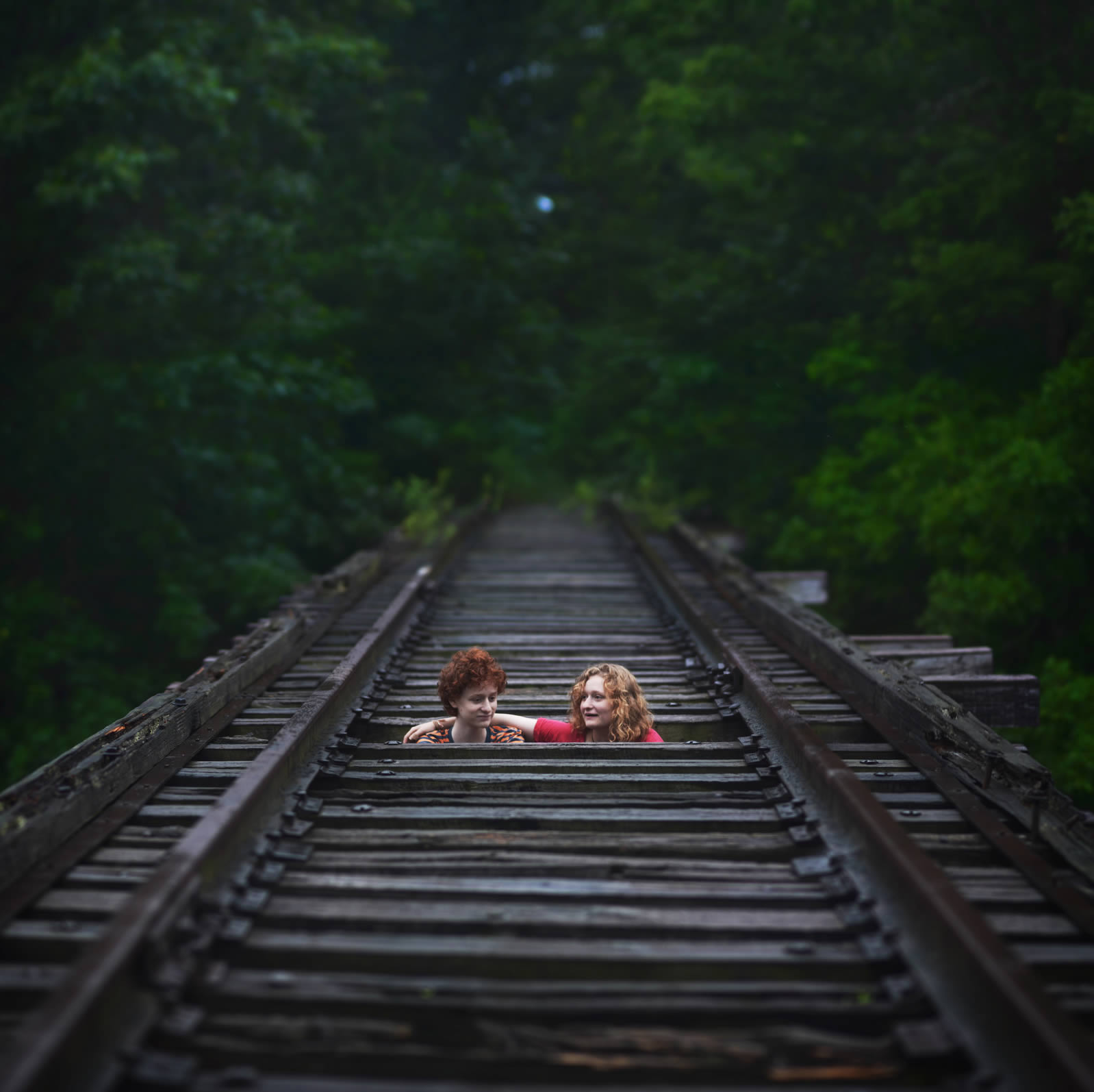 kids in train tracks, "Back (Jinky's Home) by Zev.