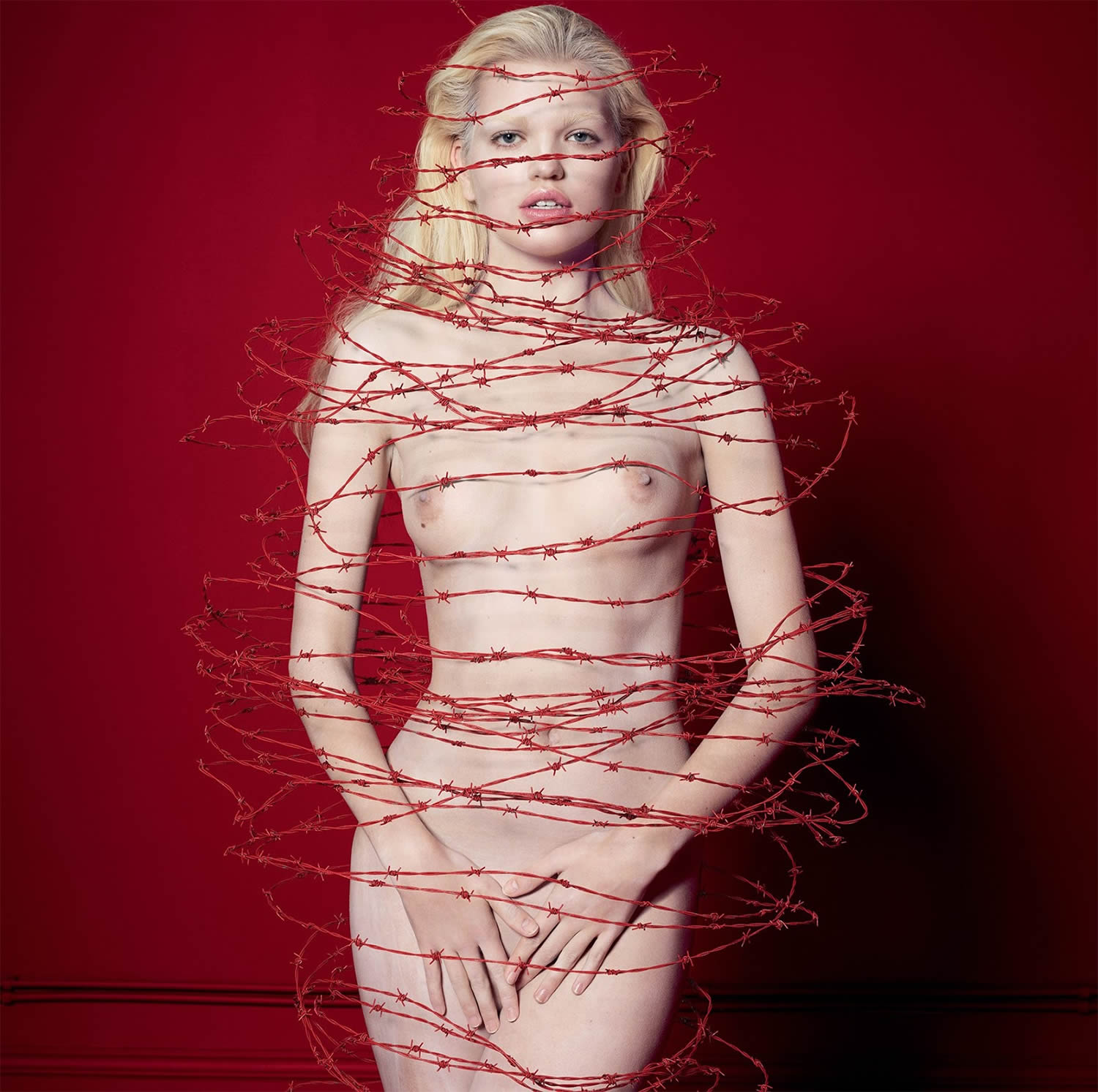 blonde girl in barb wire, cuneyt akeroglu red room