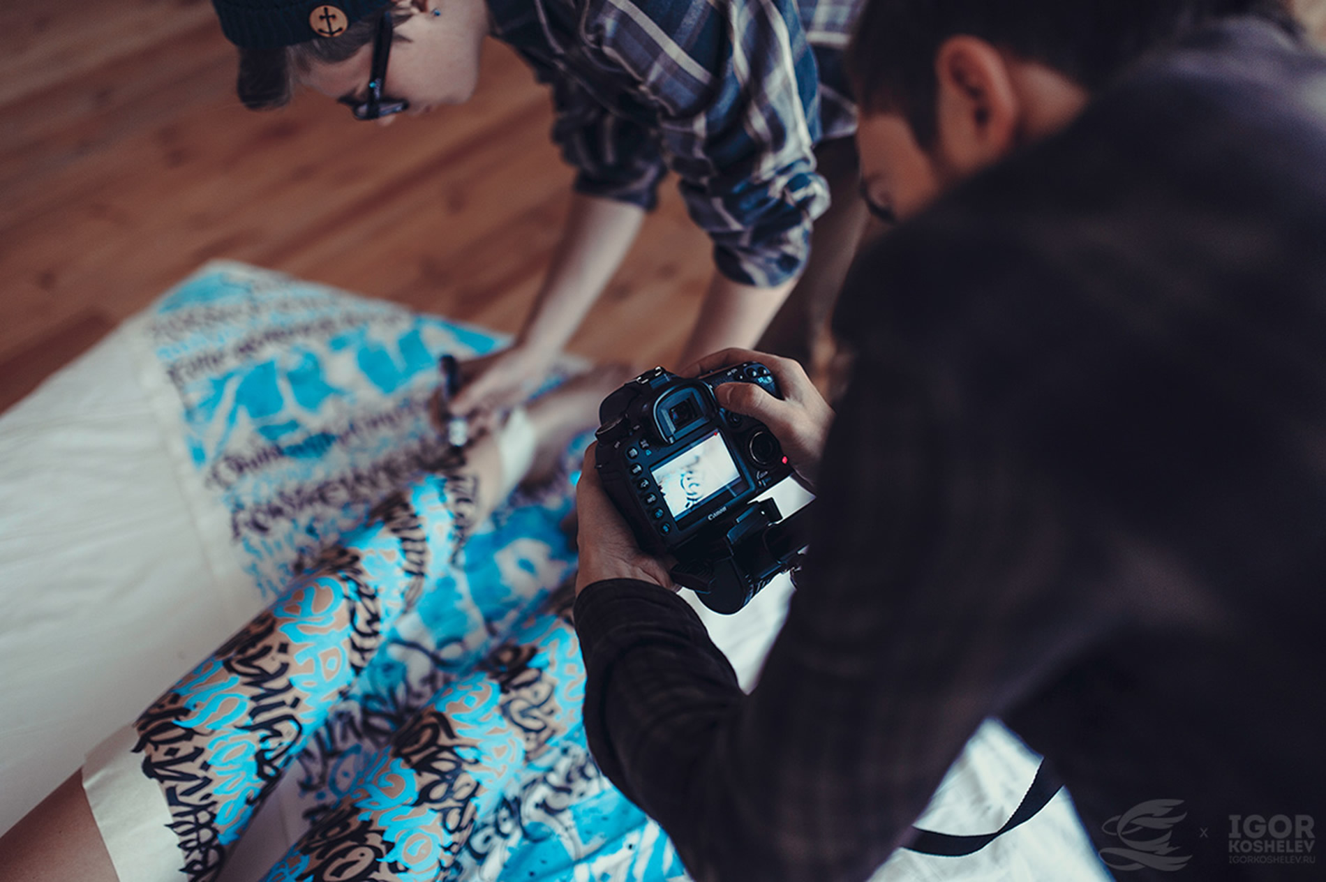 blue and black calligraphy on body