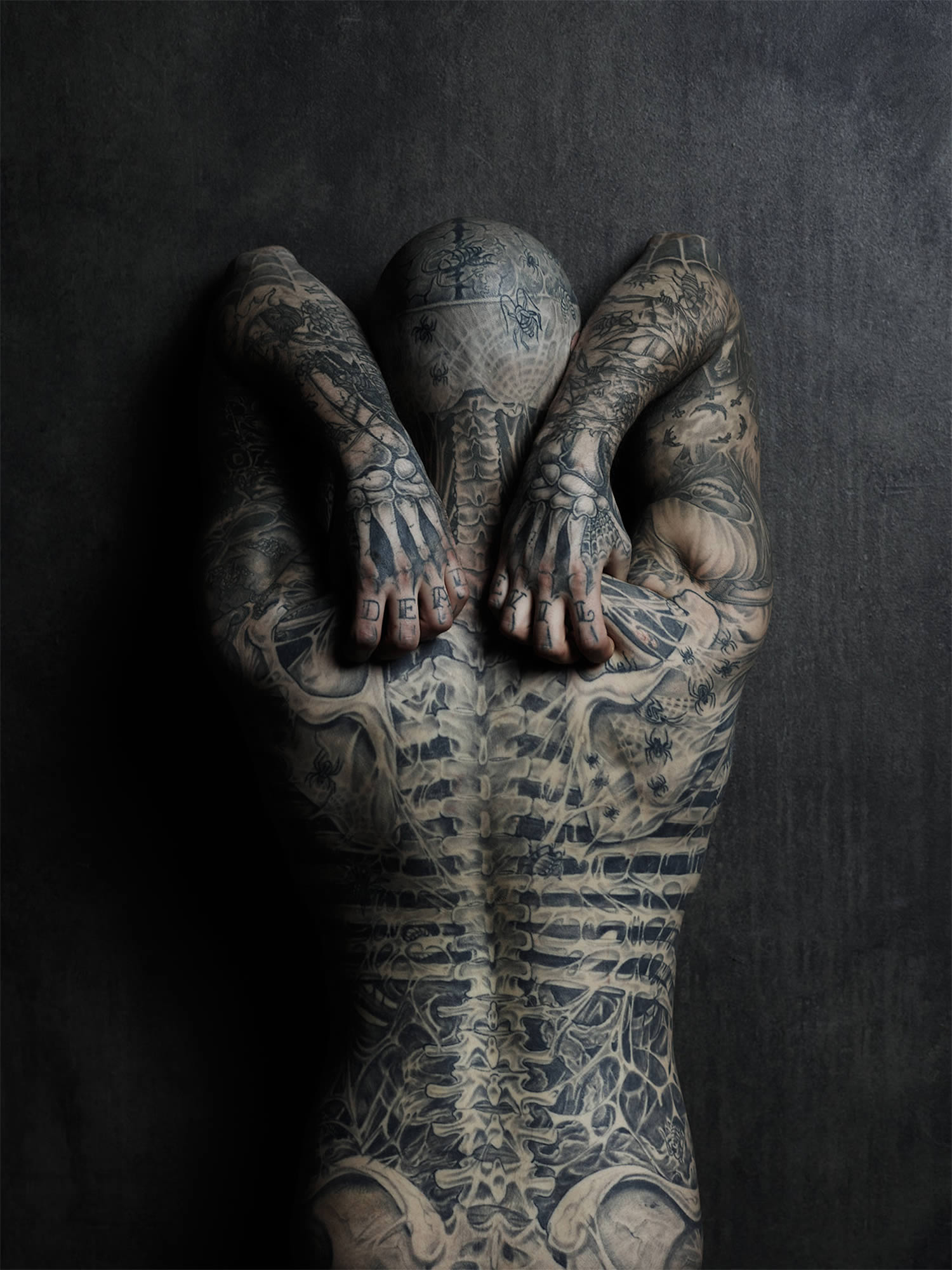 rick genest posing for rebel tattoo magazine, photo © joey l
