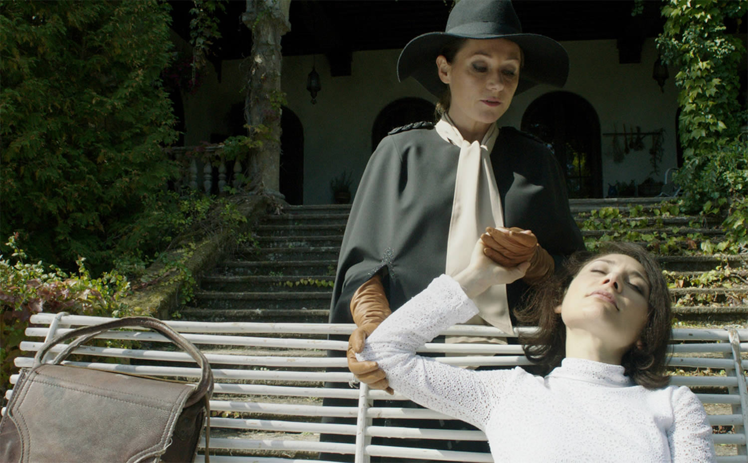 cynthia and evelyn holding hands in the duke of burgundy movie