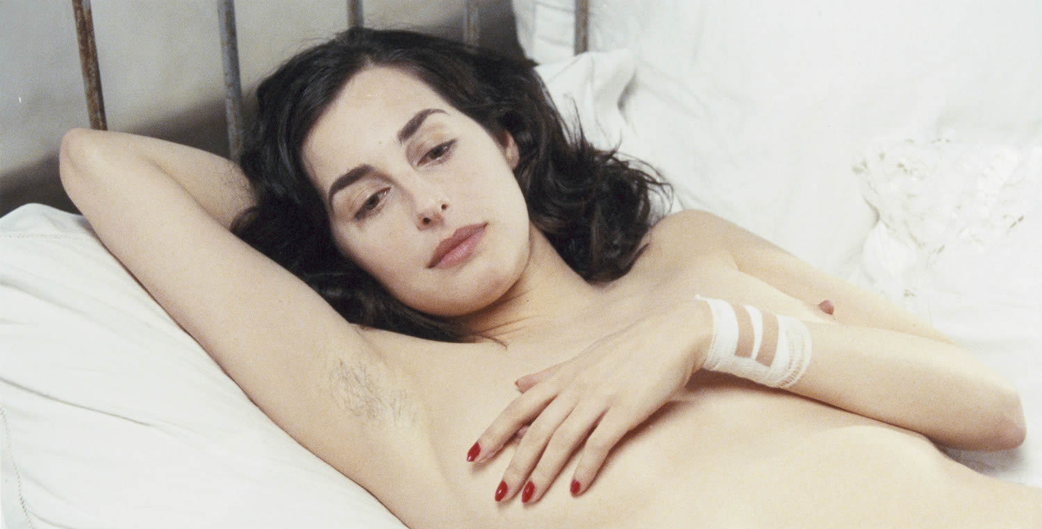 woman lying in bed with hairy armpits in anatomy of hell