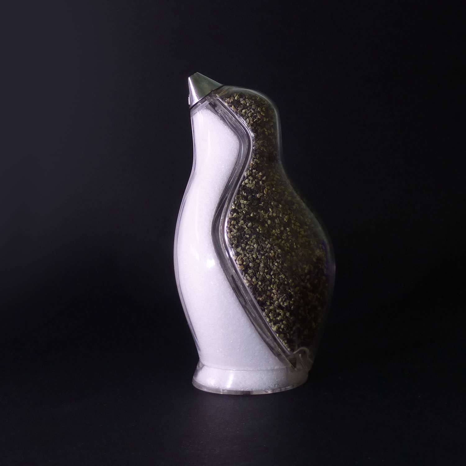 If you have been watching the TV series "Gotham," you got to get a Penguin salt and pepper shaker. Designed by Simon Colabufalo.