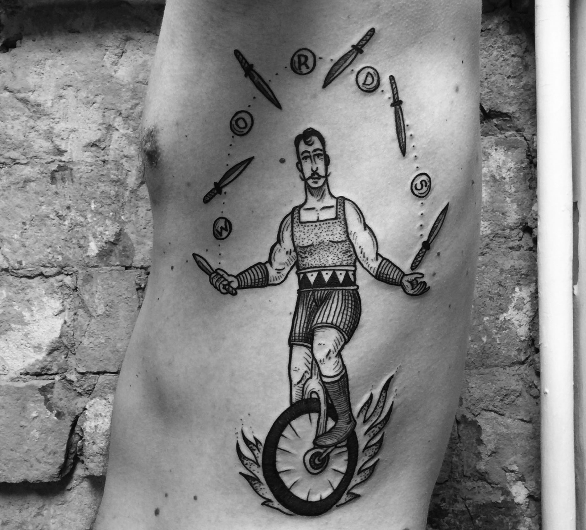 knife juggler, circus, tattoo