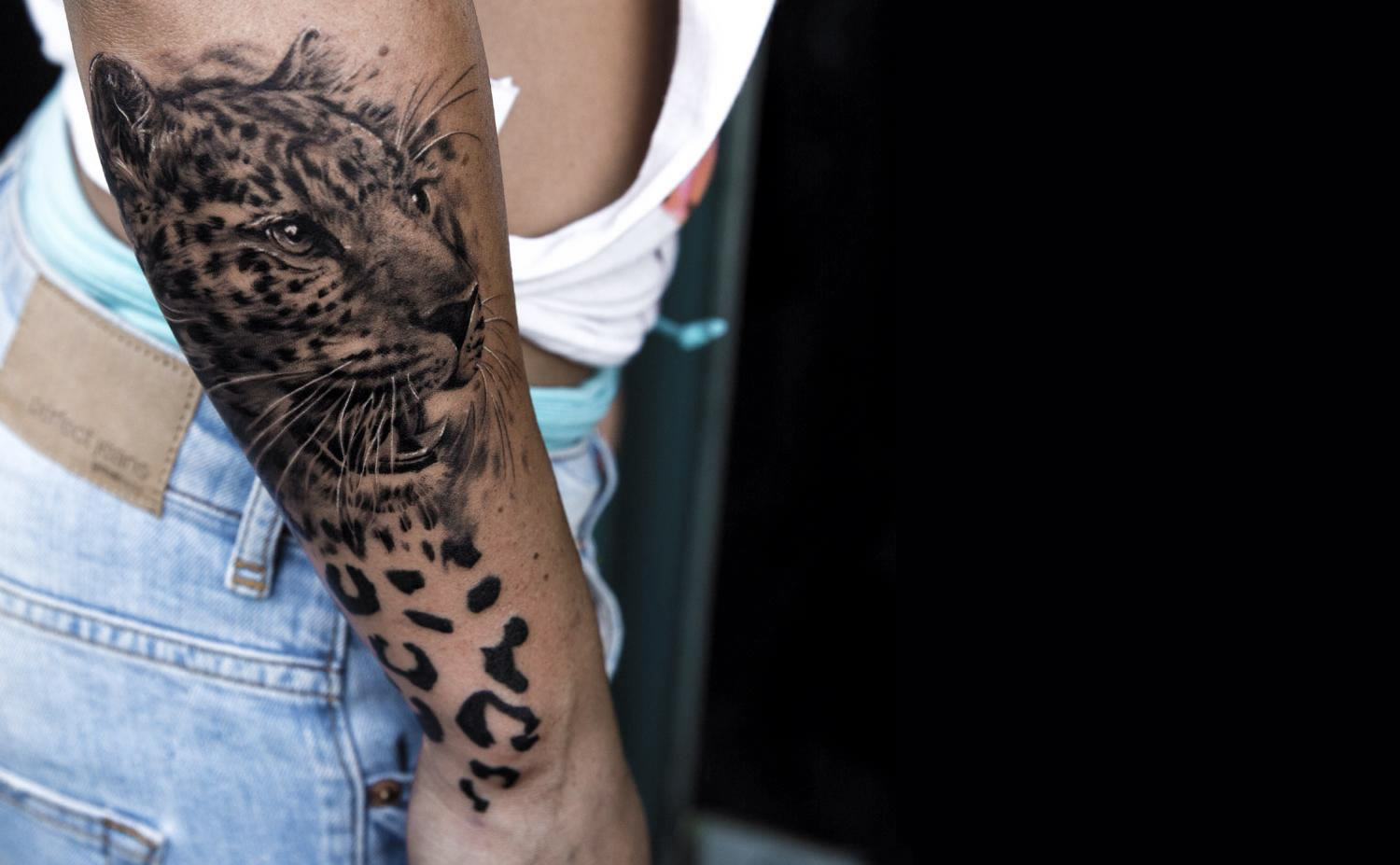 realistic tiger tattoo on arm by Niki Norberg
