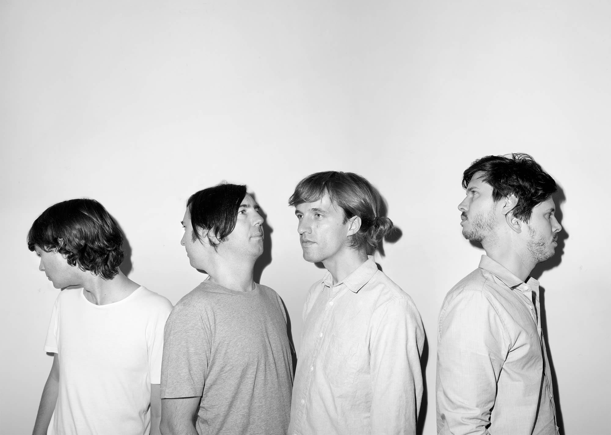 four men, some with double heads, photo by asger carlsen