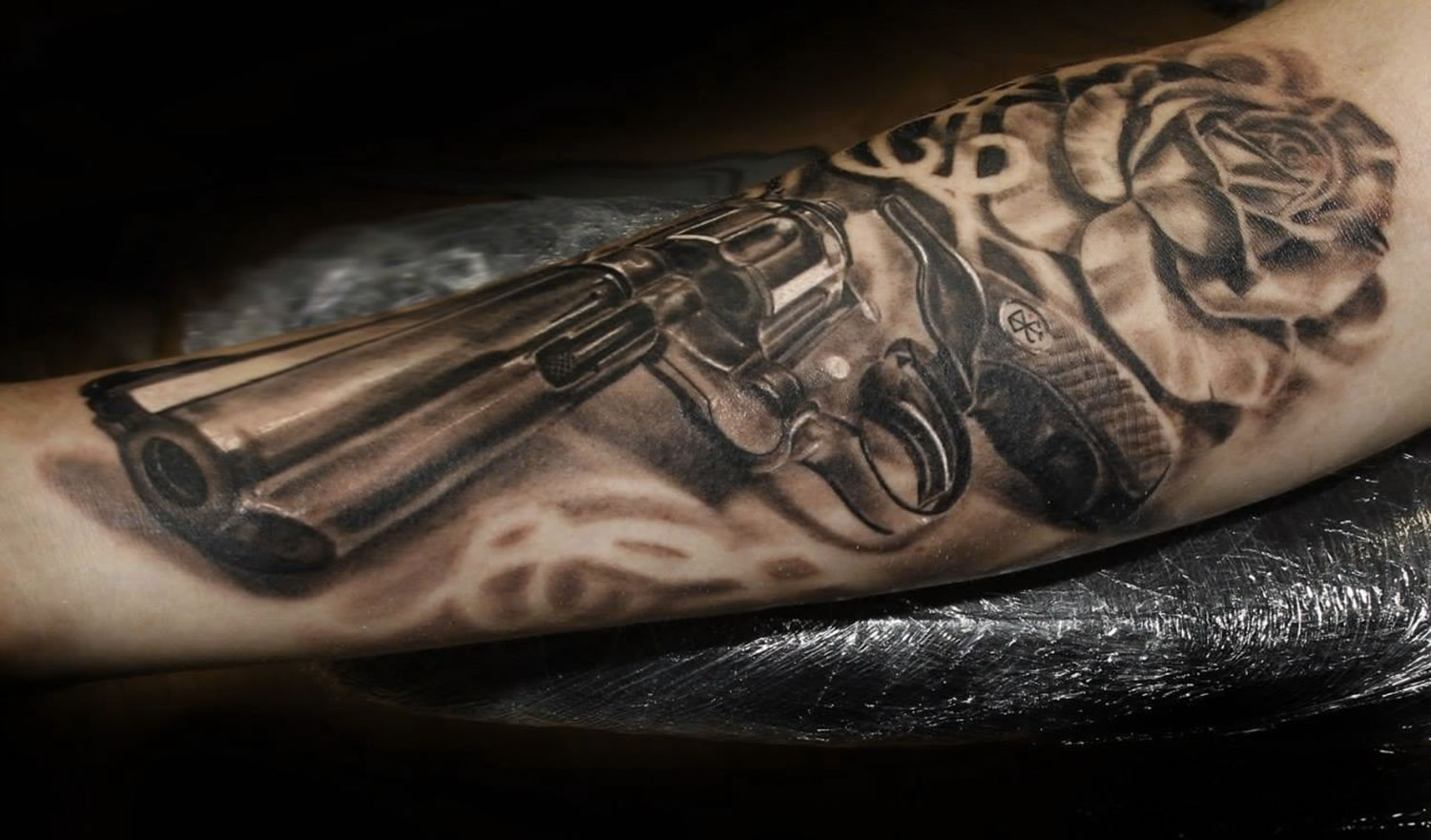 revolver gun tattoo by iwan yug