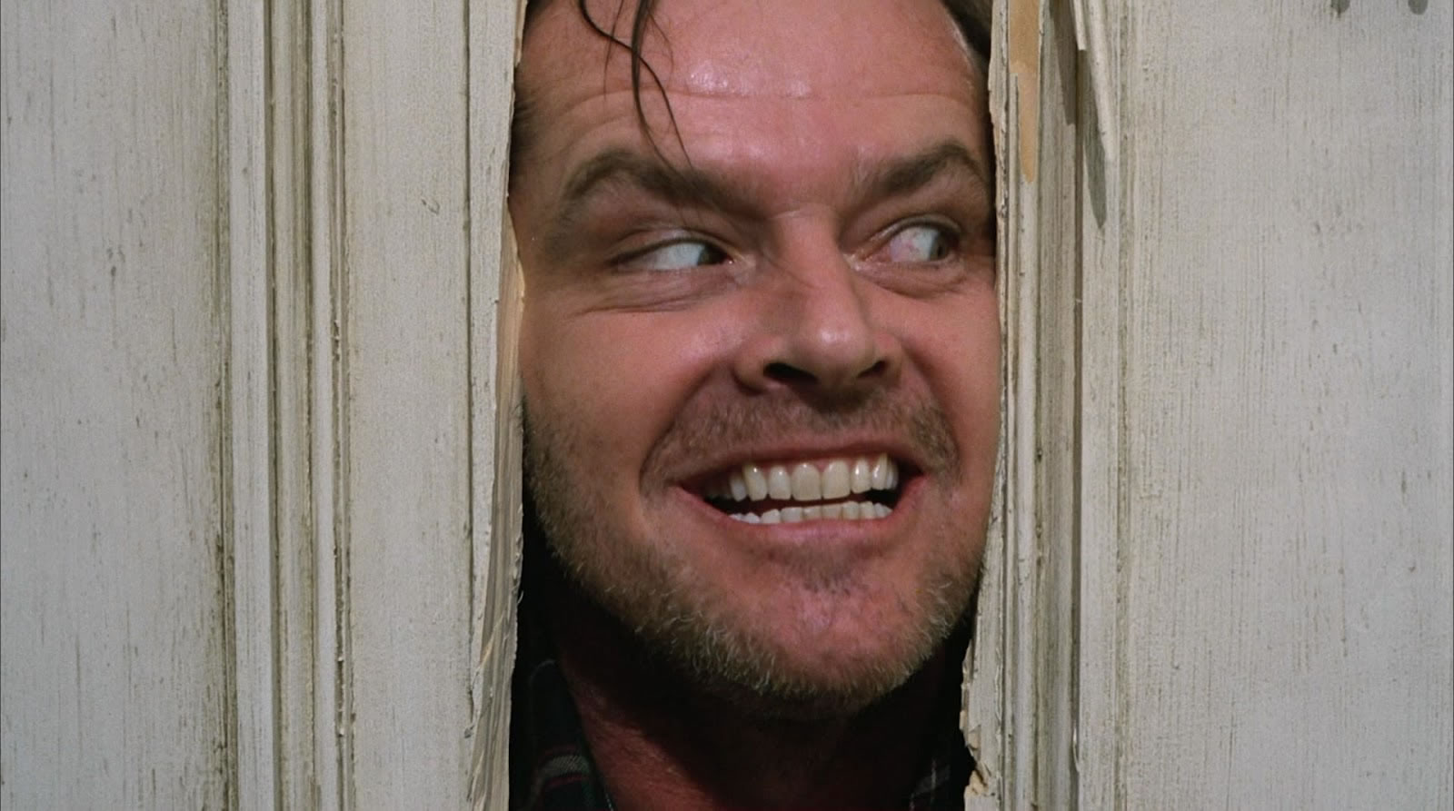 Jack Torrance (Jack Nicholson) also tries to break through a door in "The Shining" 