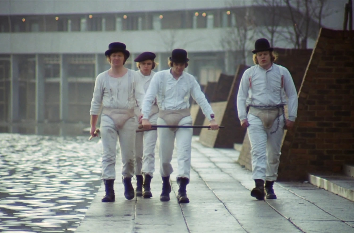 The Droogs booted up for action in "A Clockwork Orange" (1971) © Warner Bros. Pictures.