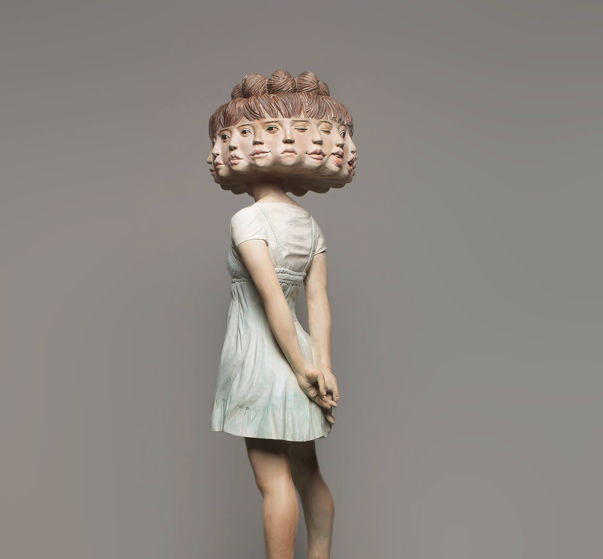 rotating head, female figure sculpture by Yoshitoshi Kanemaki