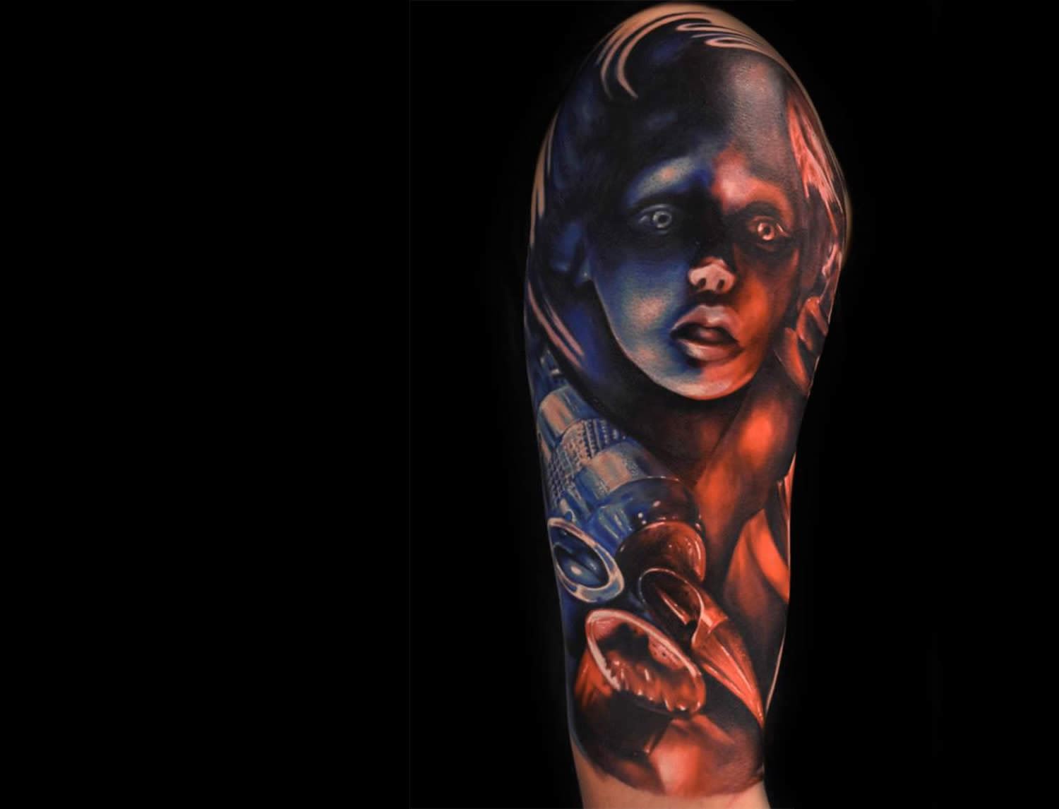 blue and red girl portrait tattoo