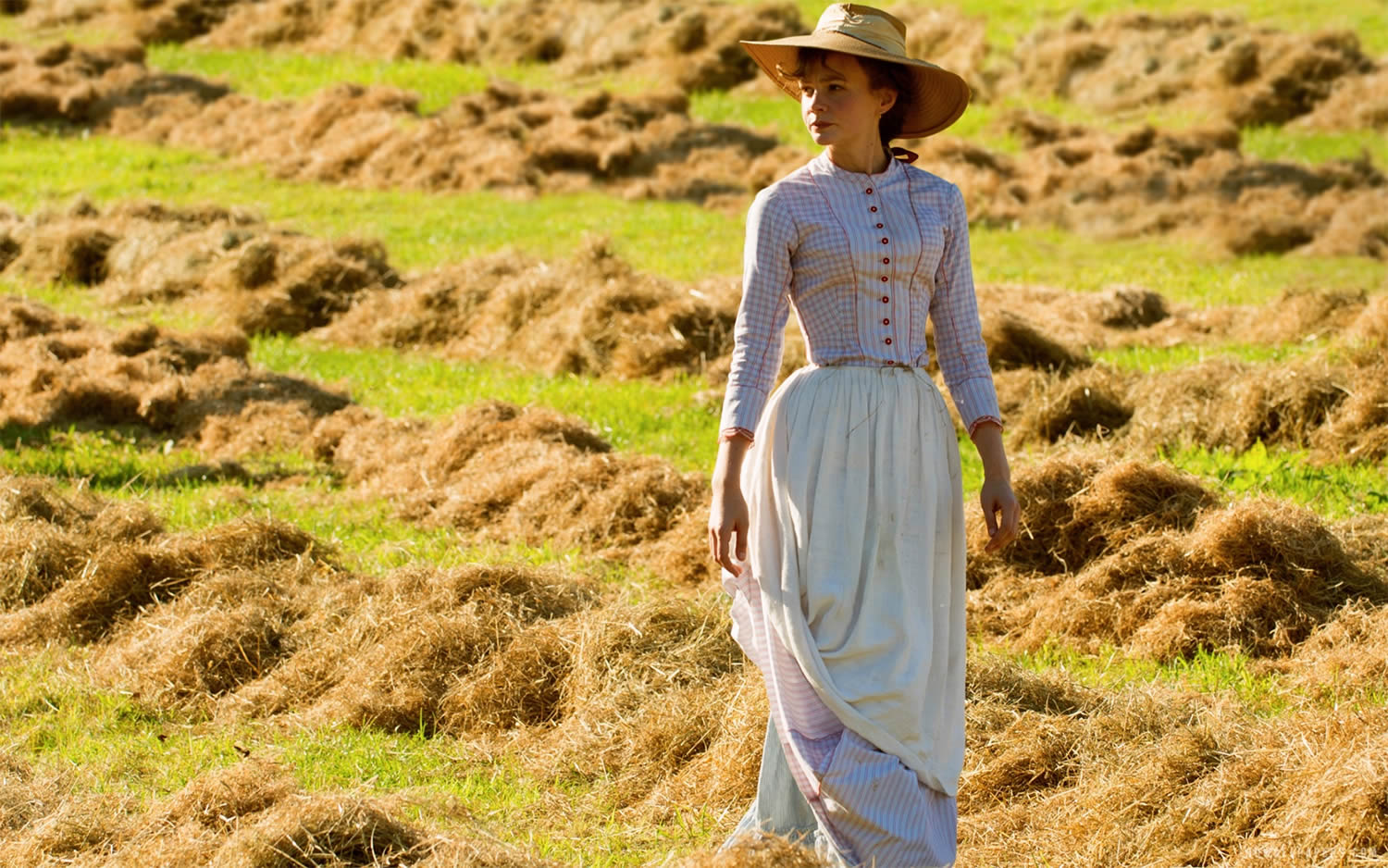 carey mulligan walking in field inFar from the Madding Crowd