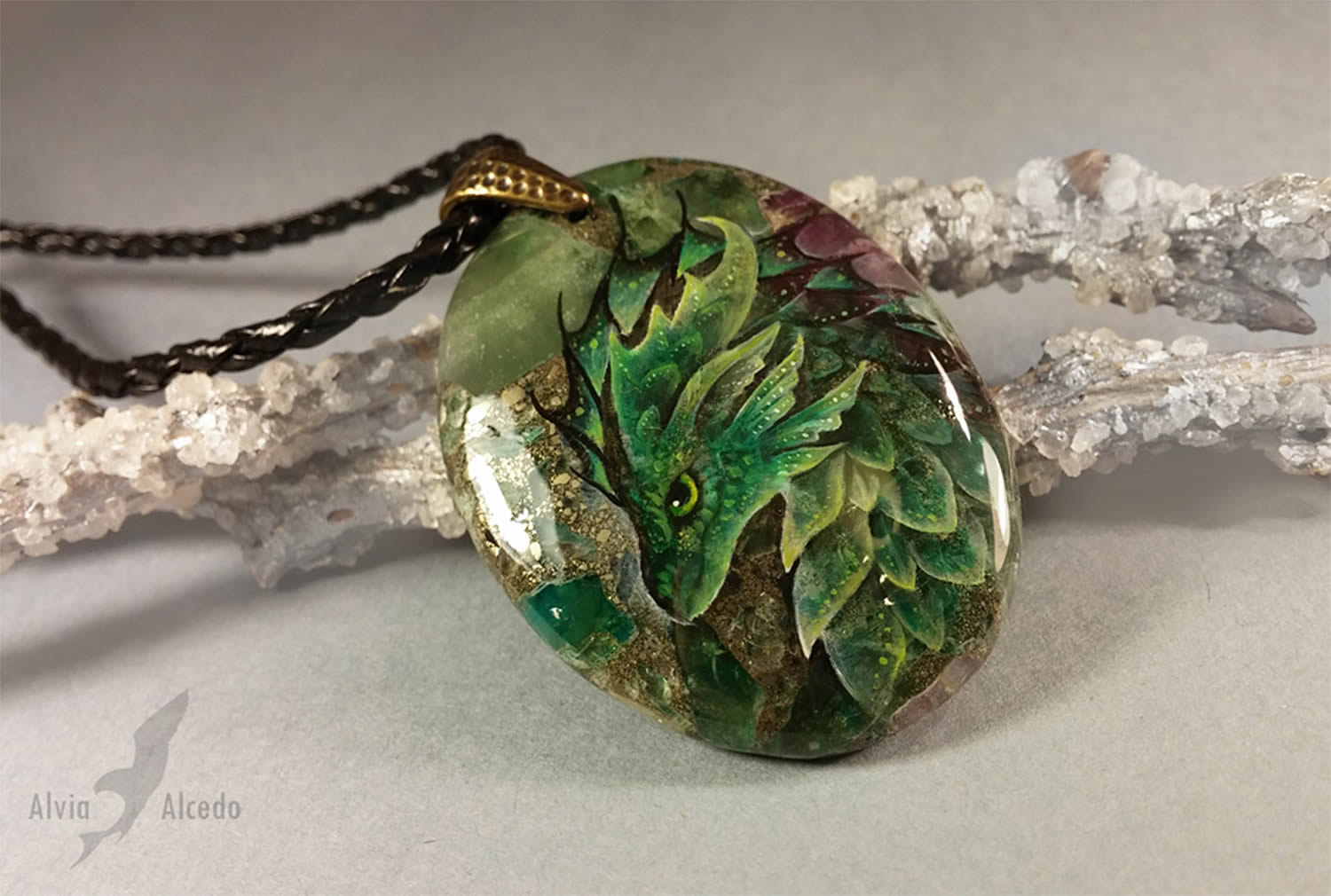 green (emerald) dragon on stone