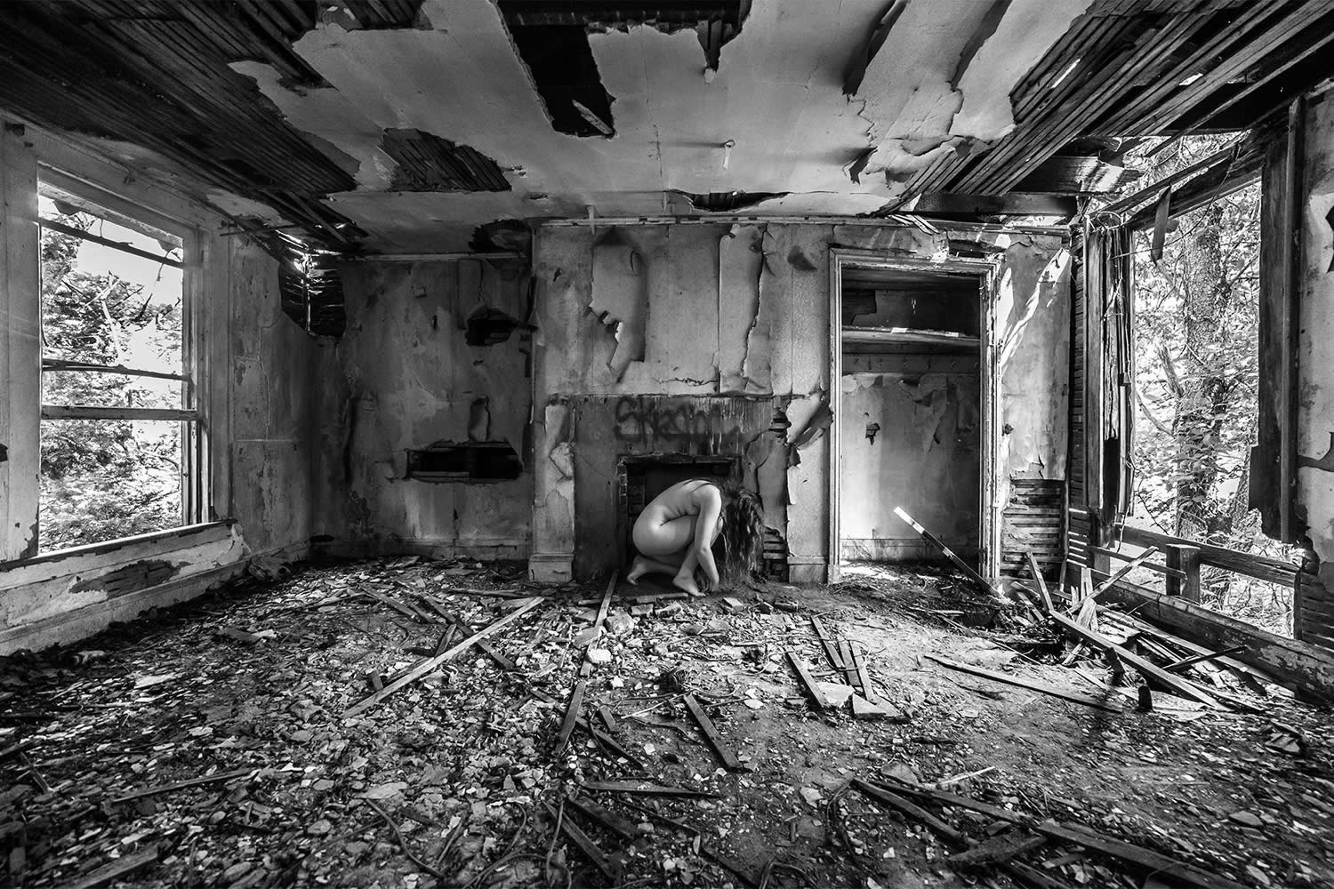 woman in fireplace, photography by brian cattelle