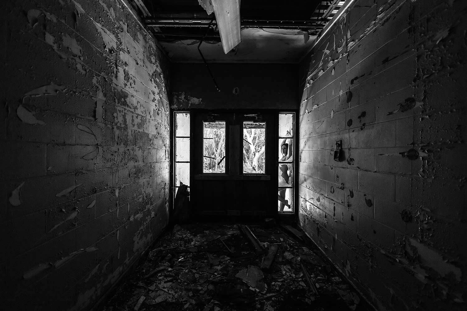 woman in window, photo by brian cattelle