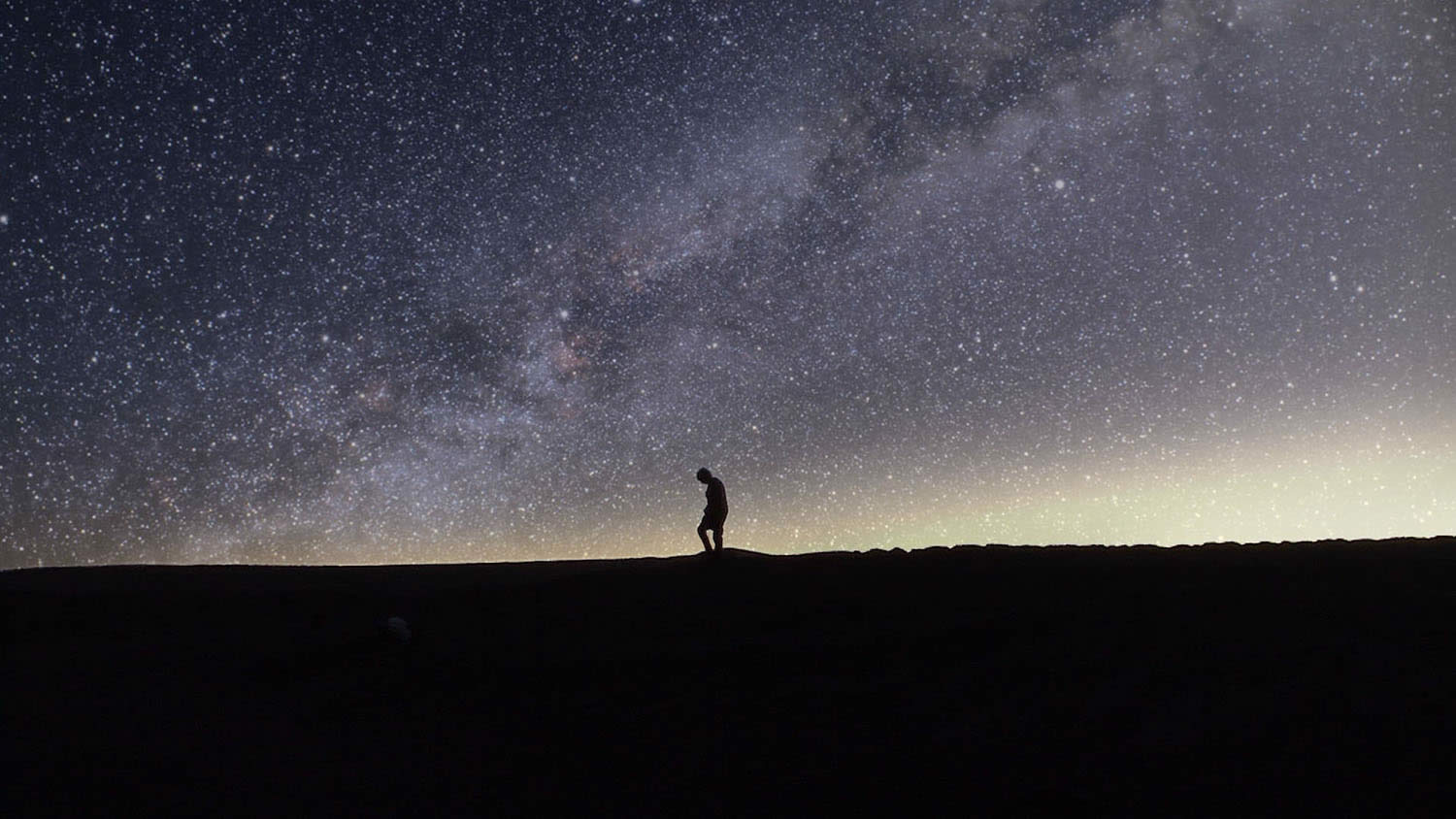 milkyway and silhouette of man in field, Nostalgia for the Light