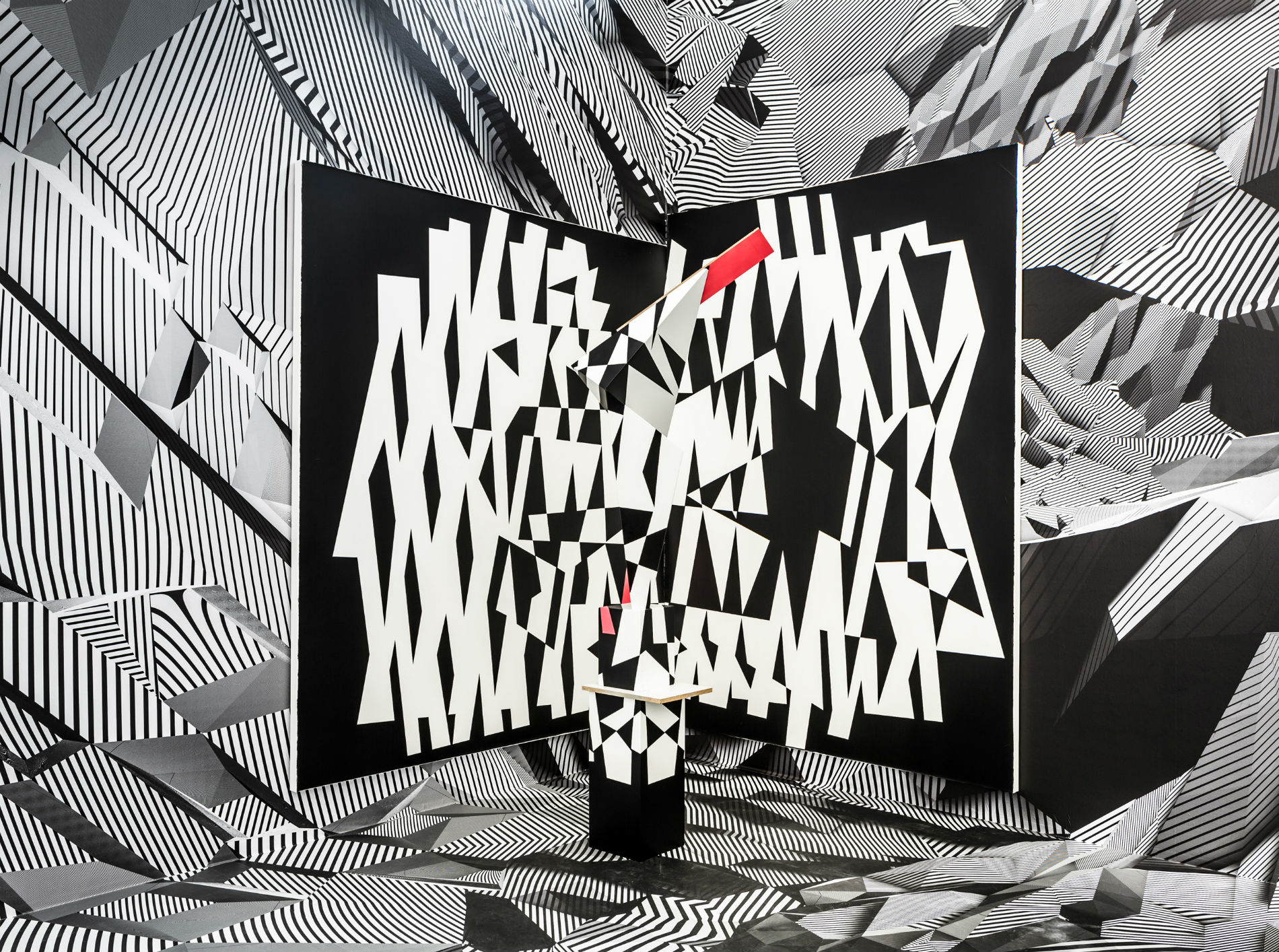 tobias rehberger op art black white installation red