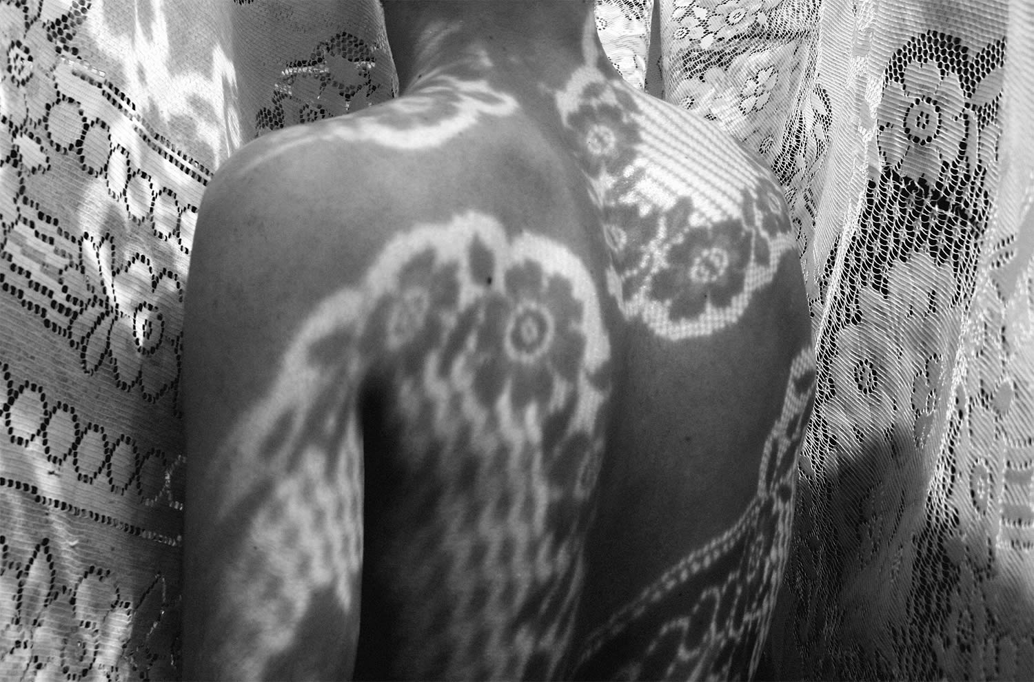 doily shadow on man by steoville