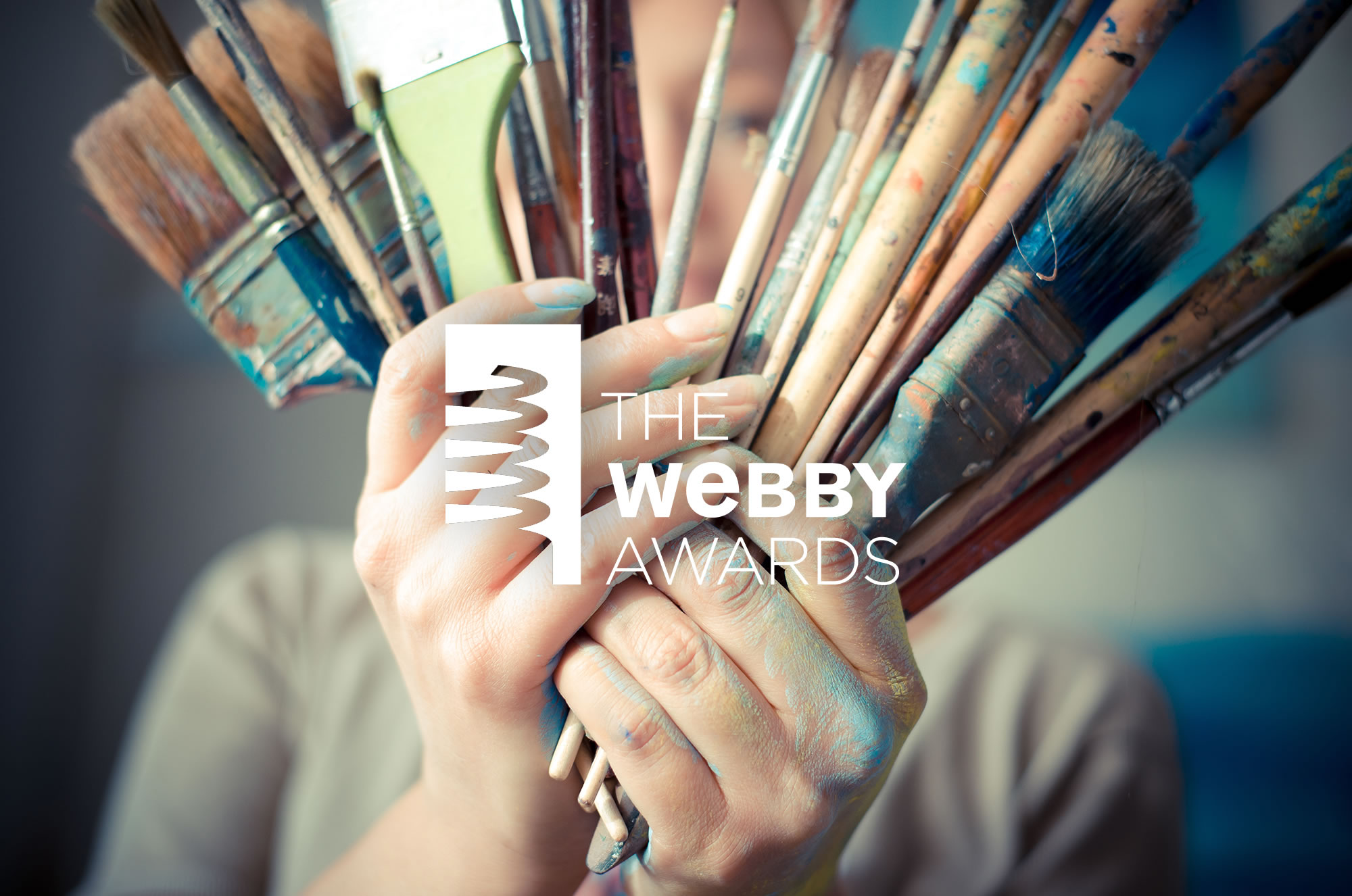 paint brushes, Illusion wins webby award