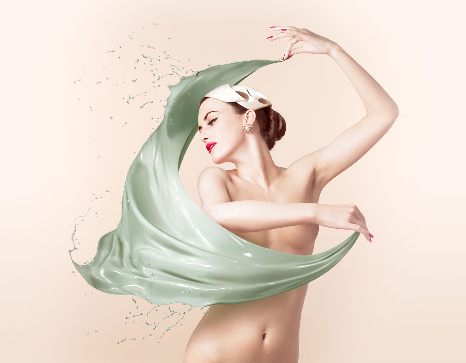 woman swirling paint cloth