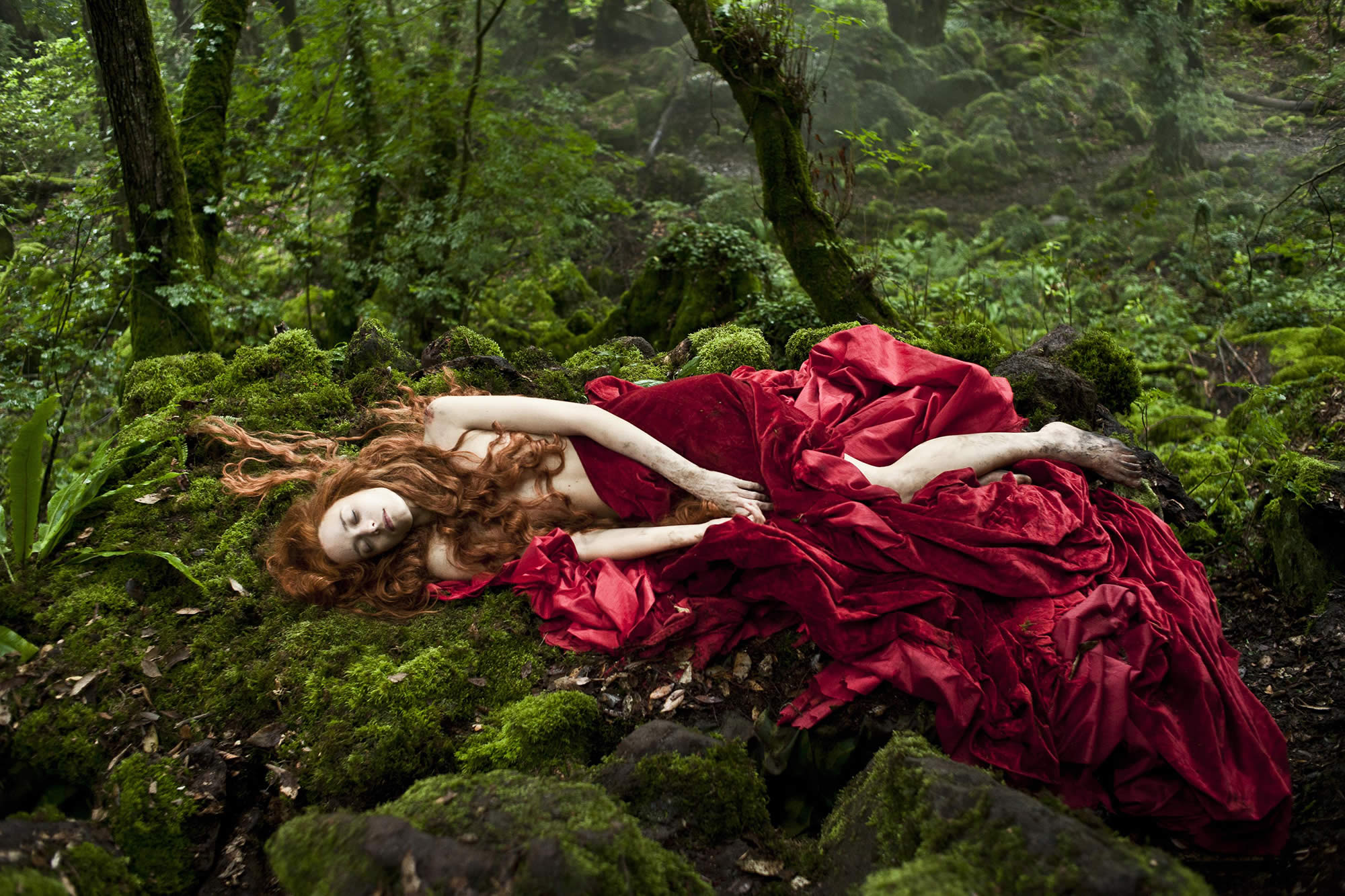 woman in red dress lying on the forest floor, Tale of Tales