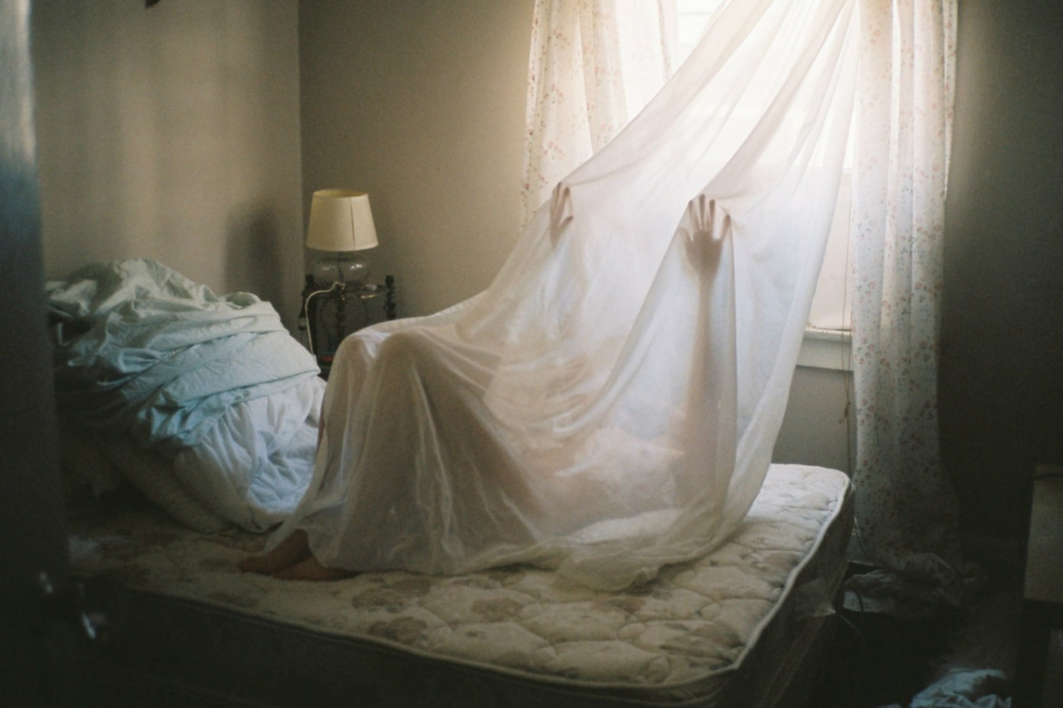 nate walton photography colour female model sheet bed