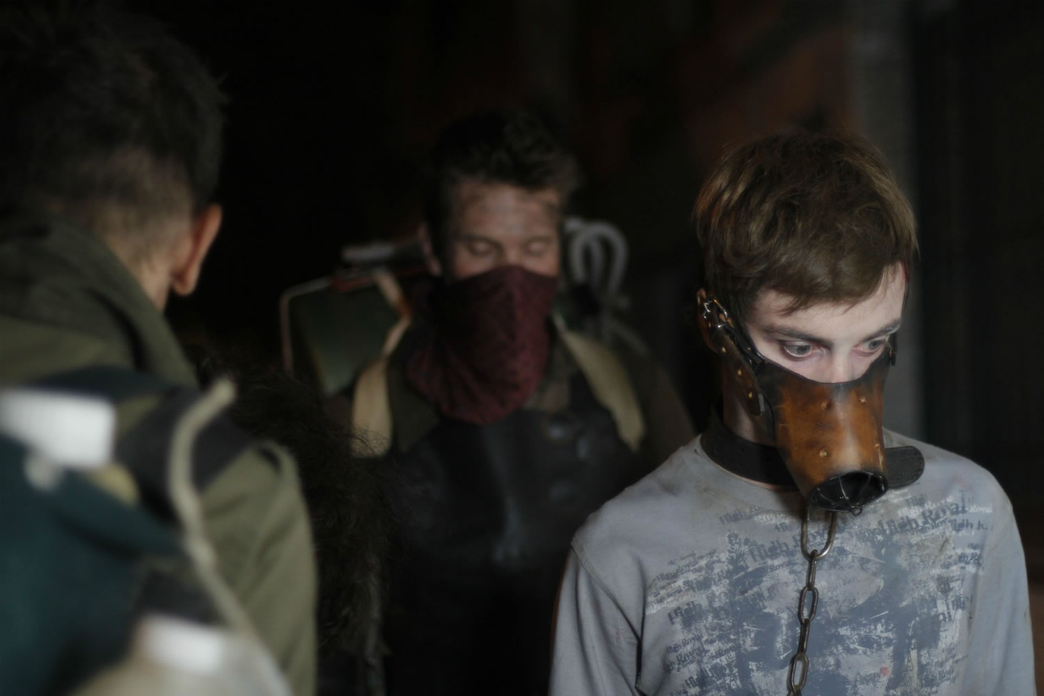 what's left of us, movie still, guy with mask