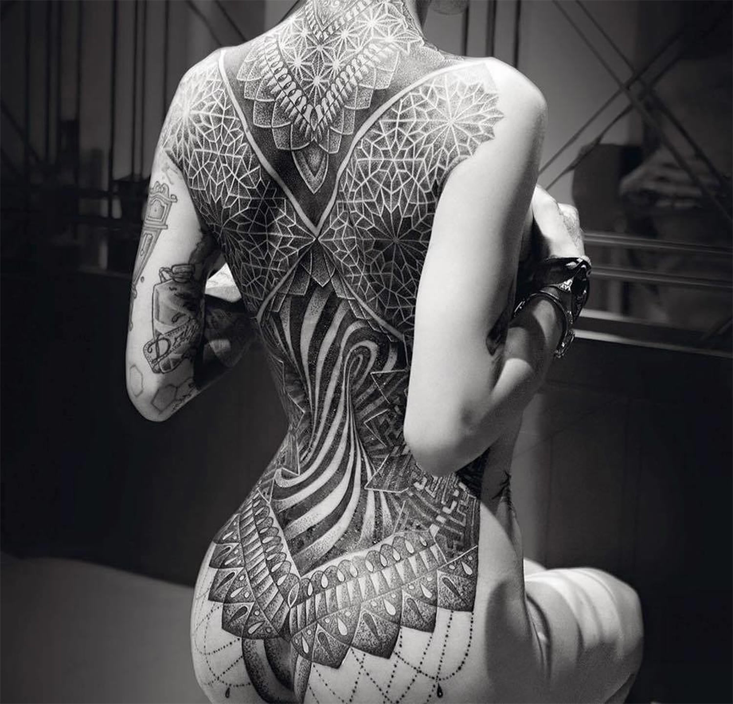 elaborate back tattoo by Glenn W Cuzen