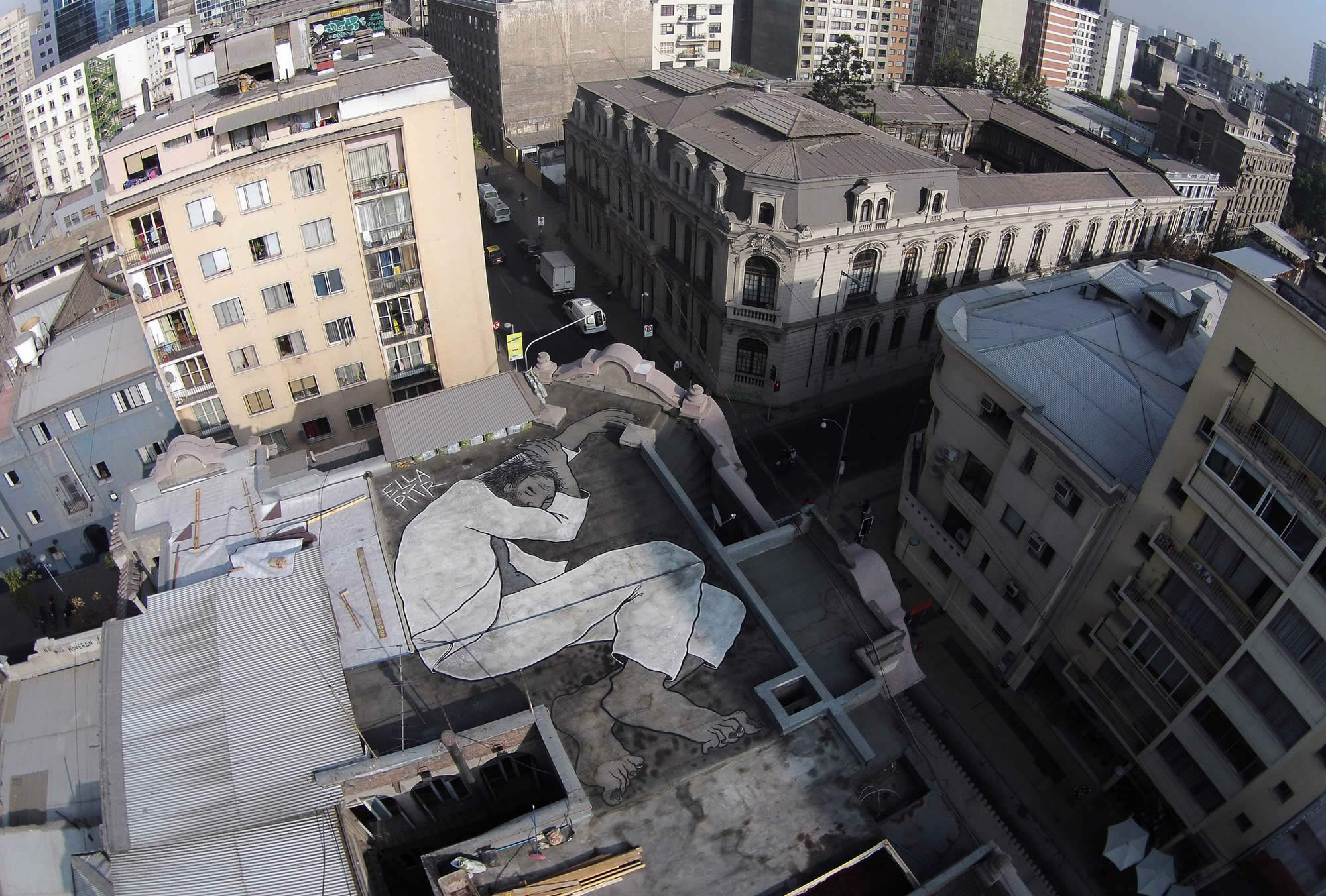 sleeping on rooftop, graffiti