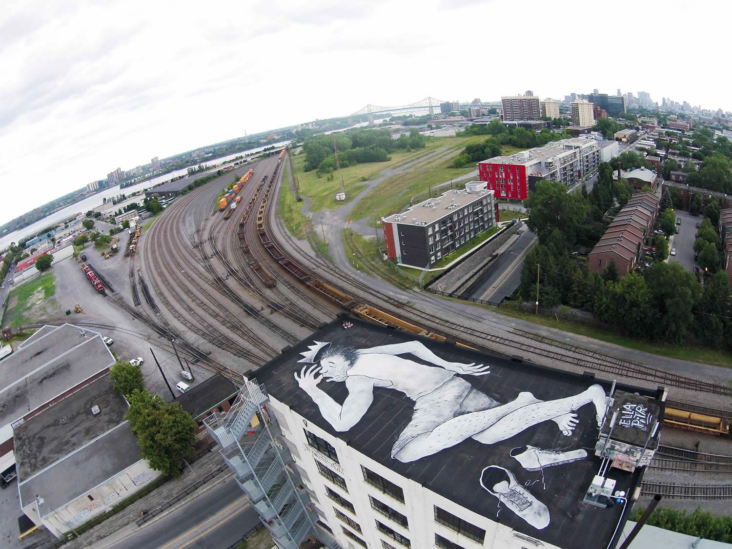 aerial view, man sleeping on rooftop