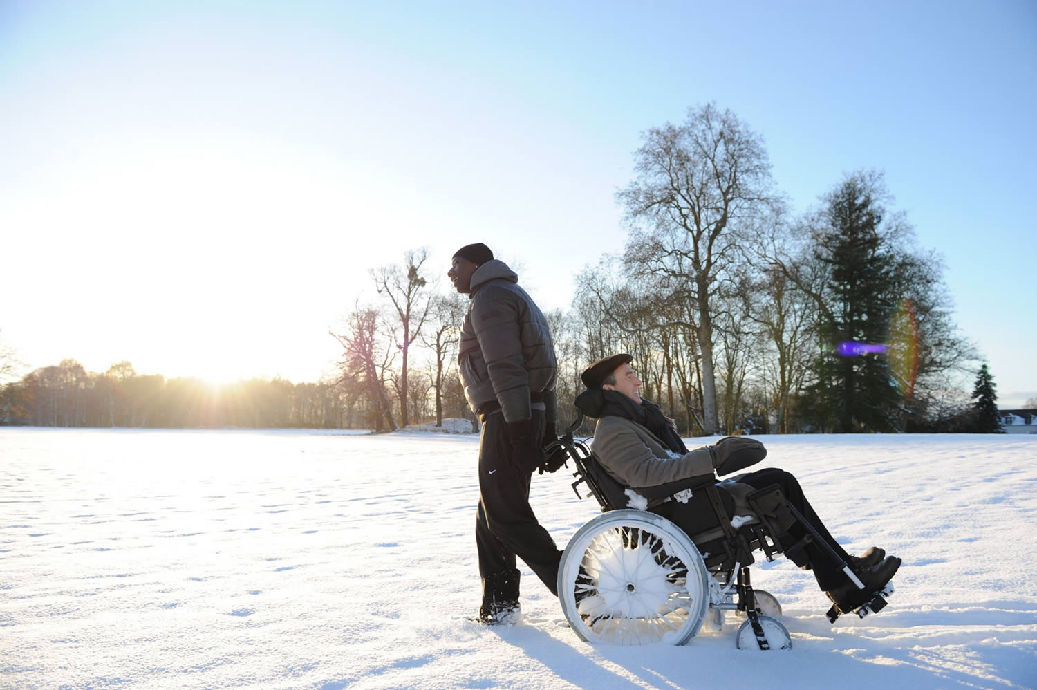 man pulling wheelchair, The Intouchables