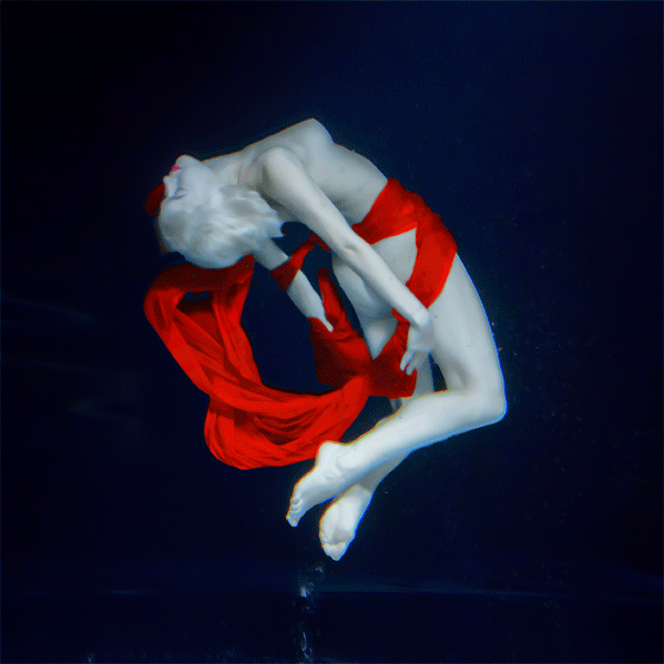 woman with red dress, underwater
